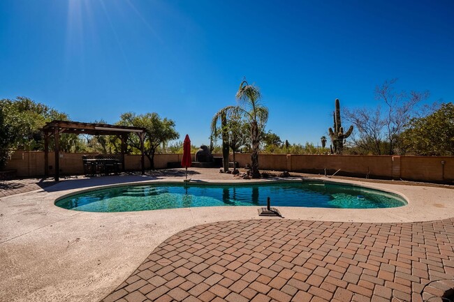 Building Photo - Hacienda-Style Gem with Pool – Spacious 3-...