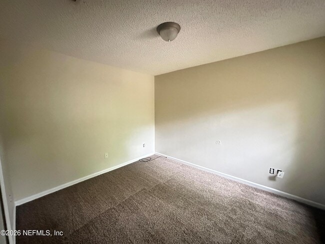 Building Photo - 7775 Playschool Ln