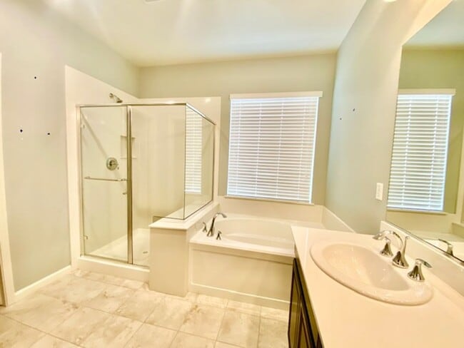 Building Photo - ALMOST NEW, UNIQUE 4 BEDROOM, 3 BATH, 2 CA...