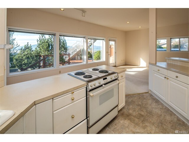 Looking toward the view from the kitchen showing the openness and all the natural light that fills this property! - 2809 Eldridge Avenue