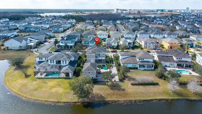 Building Photo - Luxury Waterfront Pool Home in Laureate Park | 4BR + Water Views