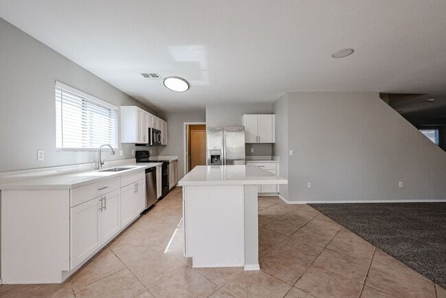 Building Photo - Introducing a stunning 4-bedroom, 2.5-bath...