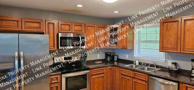 Building Photo - Coming in July!  Don't miss this Large 3 or 4 bedroom 2 full baths near Hwy 153/58.