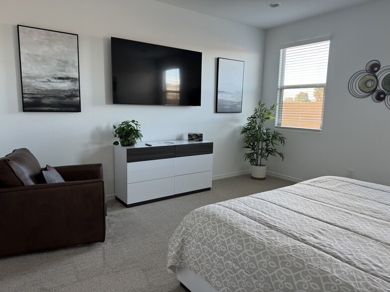 Primary Bedroom with Smart TV - 9052 W Georgia Ave