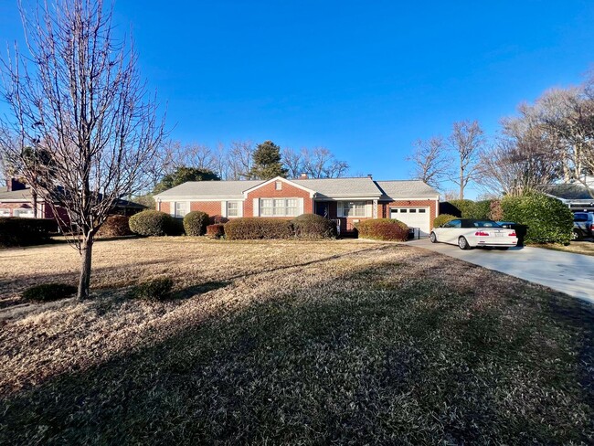 Building Photo - Lovely mid-century brick ranch on a beauti...