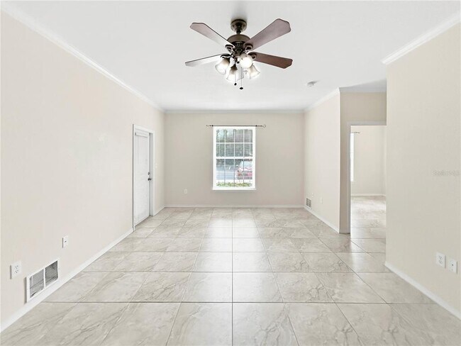 Building Photo - 10205 Courtney Palms Blvd