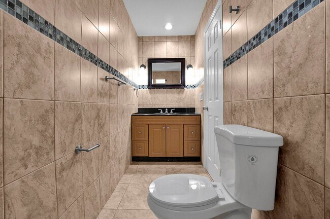 Building Photo - Sunrise Gem: Updated 2-Bed, 2-Bath with Garage Parking