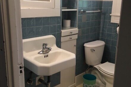 Tub behind door on right - 2615 Parker St