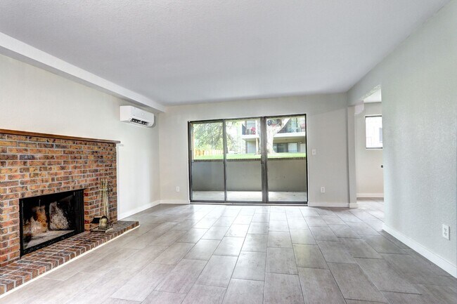 Building Photo - Updated 2 Bedroom 2 Bath Condo With Pool A...