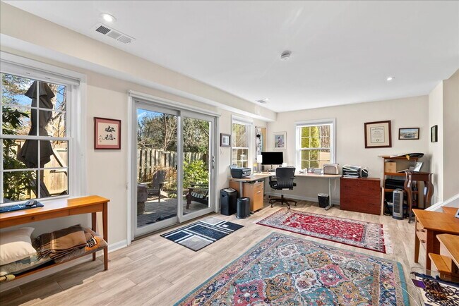 Building Photo - Beautiful End-Unit Townhome with Spacious Interior and Outdoor Living