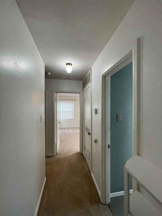 Building Photo - Your New Snyder Sanctuary: Modern Updates, Massive Storage & a Cozy Porch