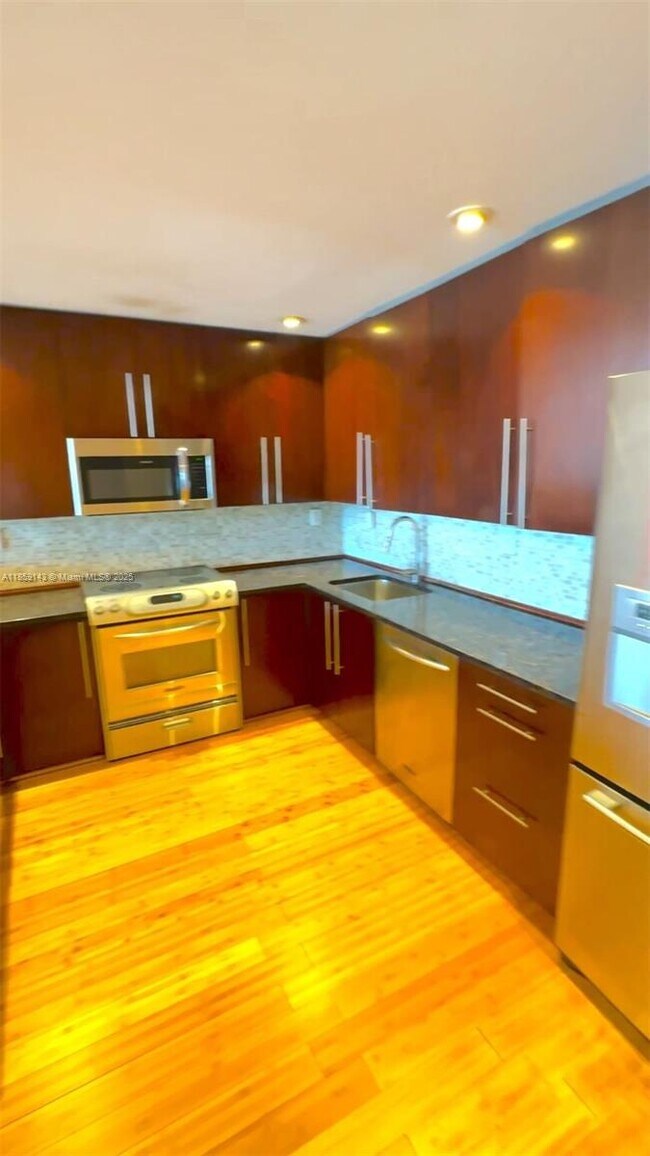 Building Photo - 19390 Collins Ave