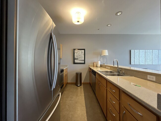 Building Photo - Top-Floor Pearl District Condo with Floor-to-Ceiling Windows, Courtyard Views & In-Unit Washer/Dryer