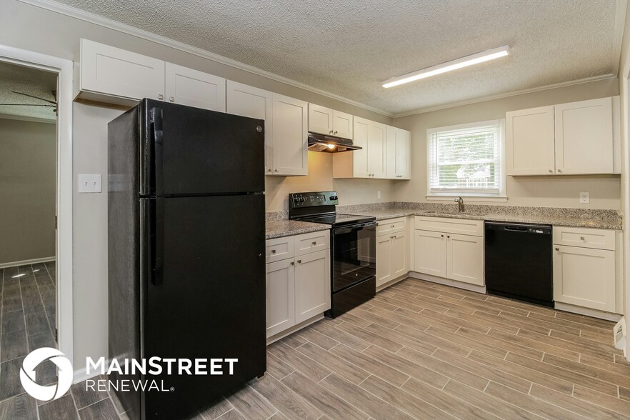 Building Photo - 3313 Woodlea Dr