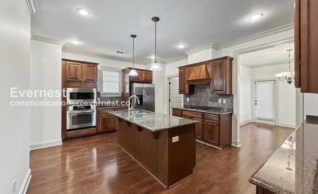 Building Photo - Home with Pool, Patio, and Fitness Center