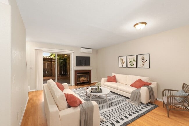 Building Photo - Fantastic 2 bedroom / 1.5 bath Townhome in gated community with AC, Patio, Pool, Laundry, EV Char...