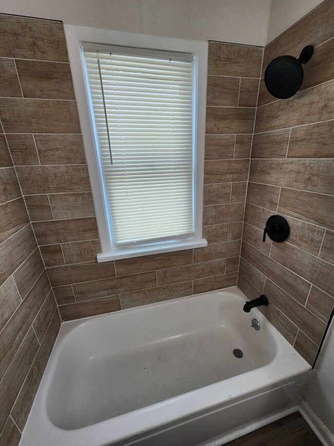 Building Photo - 2-Bedroom + Bonus Room Bungalow with Basement – Flexible Living Space