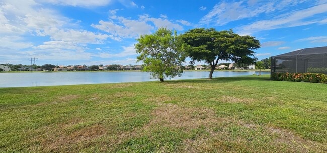 Building Photo - 4 Bedroom, 3 Bath Lakefront Home with 3-Car Garage in Stoneybrook at Gateway