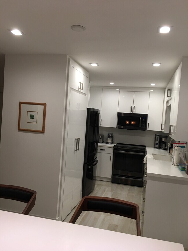 Kitchen - from breakfast bar - 935 Sweetwater Ln