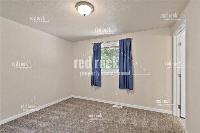 Building Photo - 2211 E 49th Ave