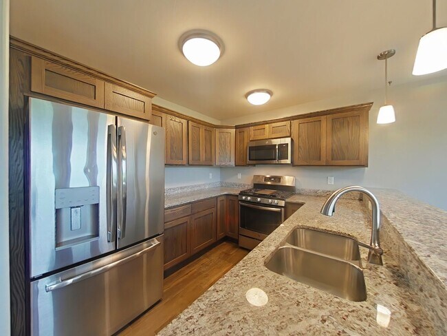 Building Photo - Stunning 3-bedroom, 2.5-bathroom condo with attached 2 stall garage!