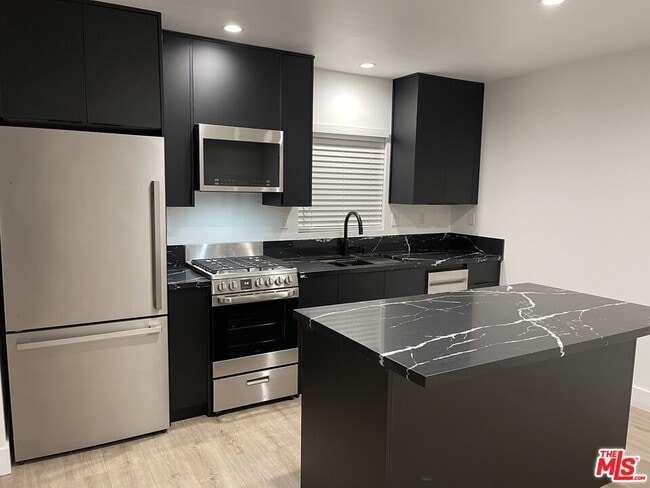 Building Photo - 9504 Gothic Ave