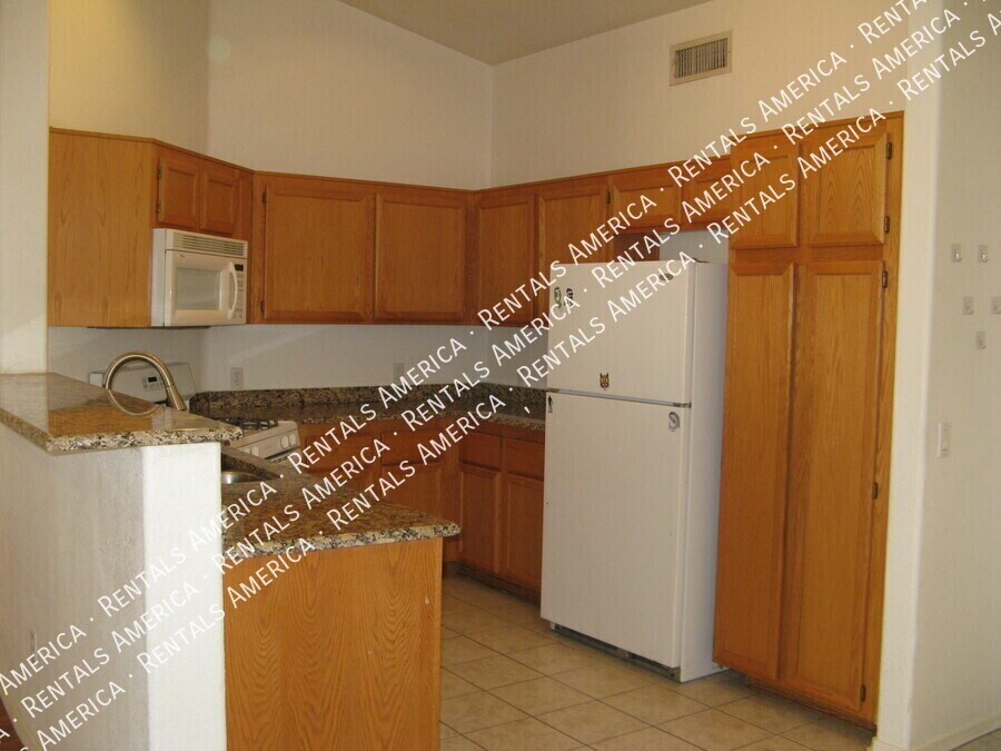 Building Photo - 8536 W Dahlia Dr