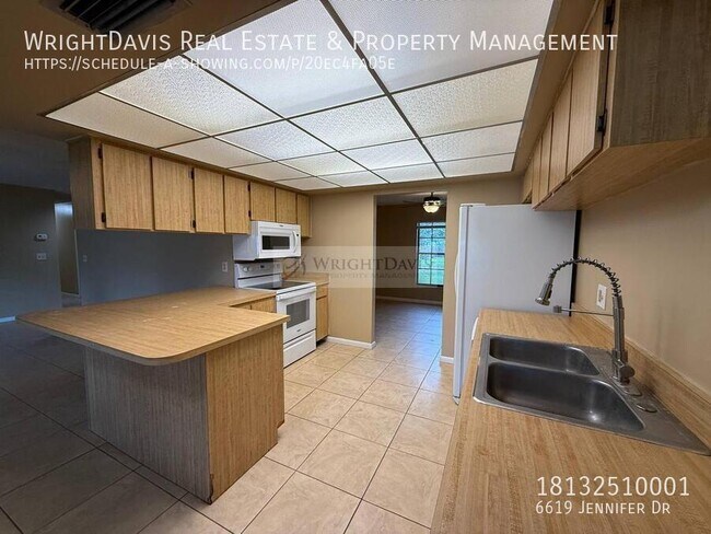 Building Photo - 6619 Jennifer Dr
