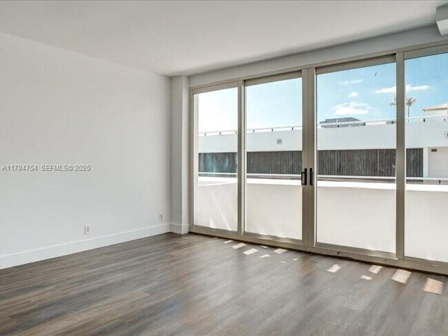 Building Photo - 9499 Collins Ave