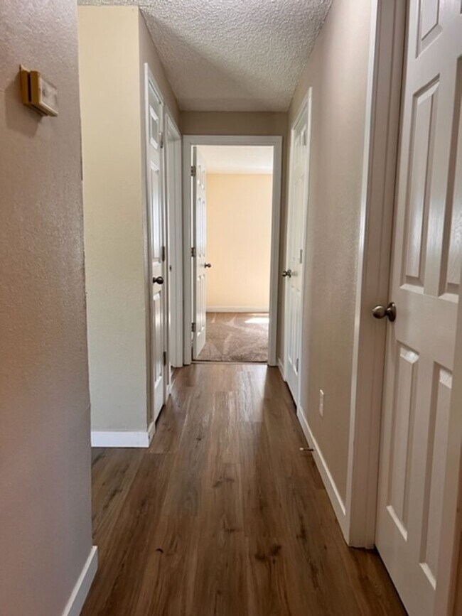 Building Photo - Three bedroom home with large yard| Available July!