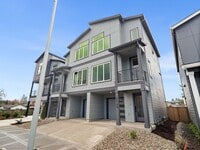 Building Photo - $1,000 move-in special! New, new, new! Gorgeous 2-bdrm/2.5-bath duplex townhome w/ garage, W/D, i...