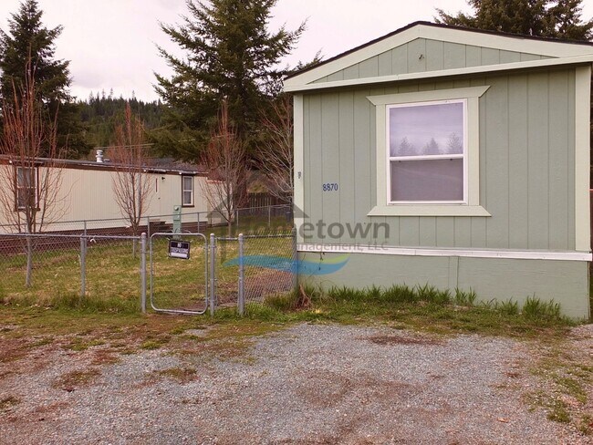Building Photo - 2 Bed 1 Bath Mobile with Fenced Yard and Storage Shed!