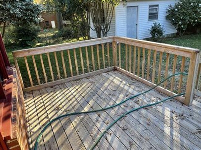 Building Photo - 2 Living Spaces and Carport