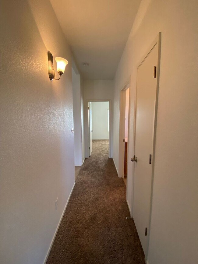 Building Photo - Large Corner Lot Home with Landscaping included!