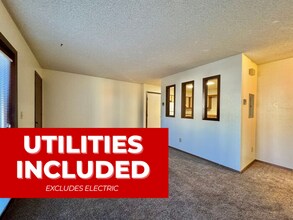 Building Photo - RENT INCLUDES ALL UTILITIES, except for el...