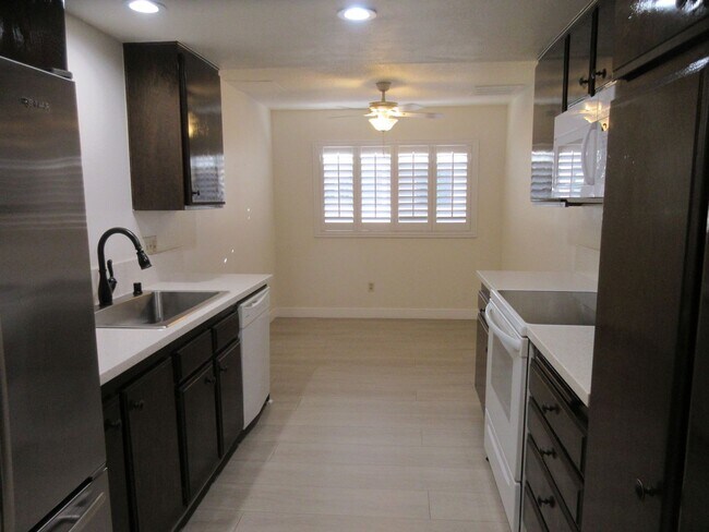 Building Photo - Duggan Property Management, Inc presents this 3BR +2.5 bath in Encino Village Townhomes