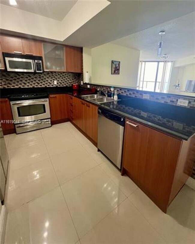 Building Photo - 16699 Collins Ave