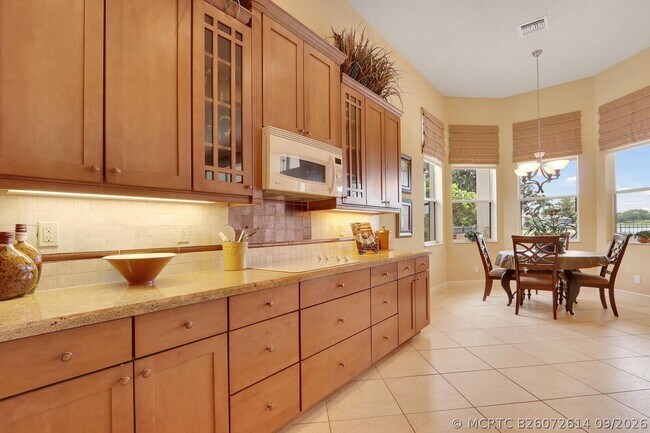 Building Photo - 9885 SW Torriente Ln