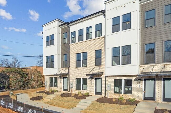 Building Photo - High-End 2BR Townhome | Rooftop Terrace + 2-Car Garage | 24-Unit Commnity