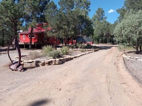 Building Photo - COZY HOME IN THE BEAUTIFUL TOWN OF TIJERAS | Showings available NOW!!