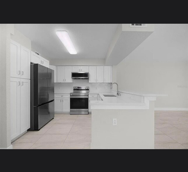 Building Photo - 13929 Fairway Island Dr