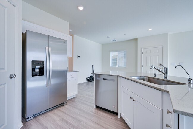 Building Photo - NW 3 Bedroom Townhouse!! Gated Community Pool!! 2 Car Garage!!! No Carpet downstairs.