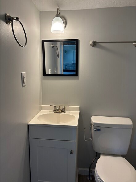 1/2 bath (1st floor) - 111 Oak St