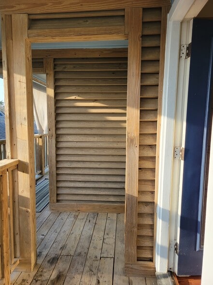 Back door facing privacy screen between upstairs units - 1017 11th St