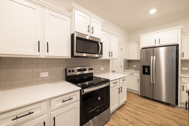 Building Photo - Free Month's Rent! NEW Townhome within Wal...