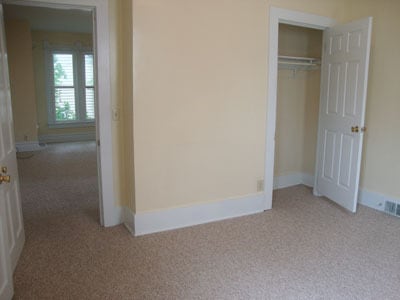 Back bedroom with closet. Door to living room is on the left. - 512 S Center St