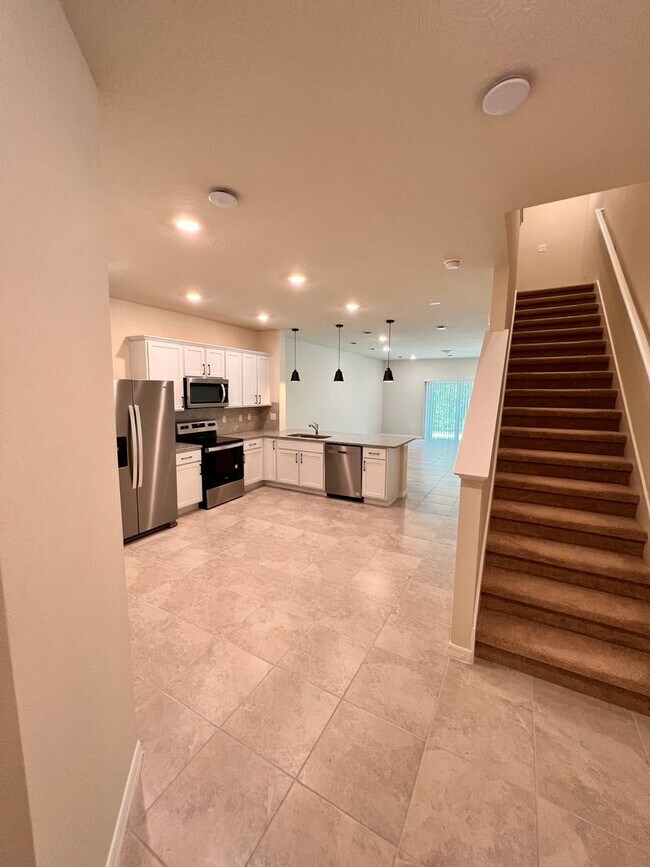 Building Photo - Move In ASAP!! - Brand New 3 bedroom 2.5 bath Townhouse for rent in Kissimmee, FL.