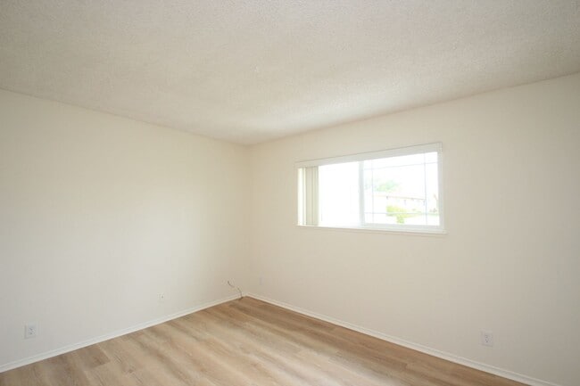 Building Photo - Welcome to this beautifully refreshed 4-bedroom, 2-bath two-story home located in desirable North...