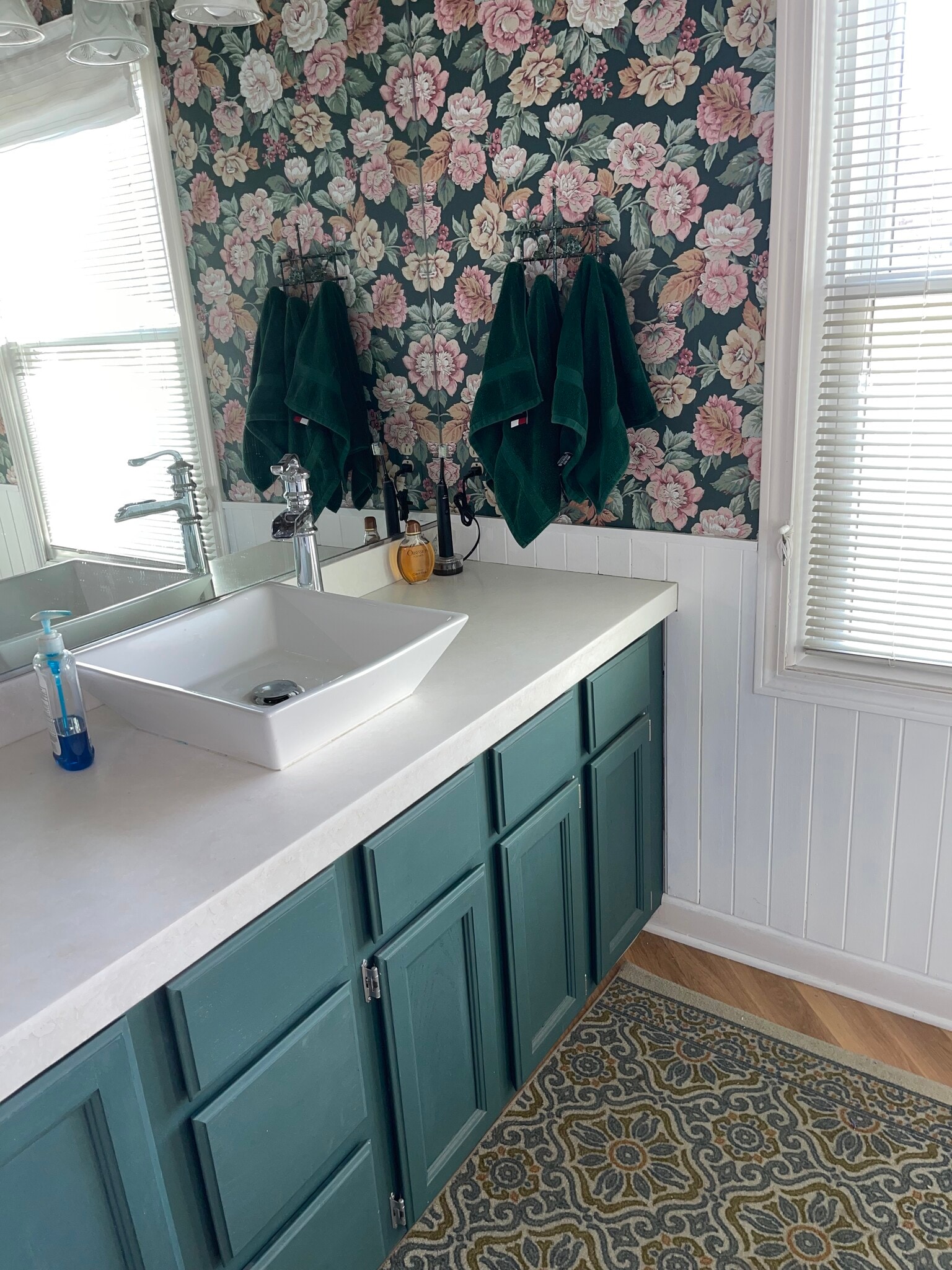 Main floor half bath-off garage entry - 6349 Woodhall Ct