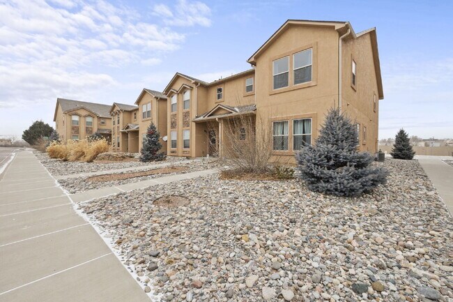 Building Photo - "Beautiful Townhome 3-Bedroom  2.5 Baths no carpet home, just 7 minutes from Fort Carson!"